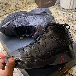 Kids size 13 Jordan 9s.